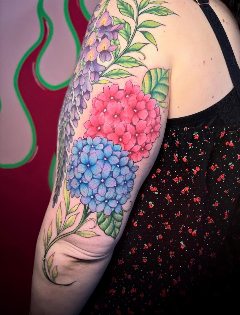 Work by Black Coral Collective (Tattoo)